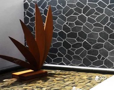 ebony-on-mesh-crazy-paving-tiles-and-pavers-outdoor-tiles-outdoor-pavers-dark-tiles-black-tiles-by-stone-pavers-melbourne-national-tiles-bunnings.webp